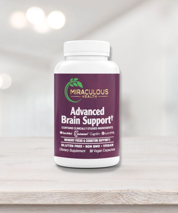 Miraculous Health Advanced Brain Support supplement bottle positioned on a light wooden surface with a clean background. The label highlights clinically studied ingredients such as BacopaMind, Brainberry, Cognizin, and NutriPS, designed to support memory, focus, and cognitive function. The product is gluten-free, non-GMO, and vegan, containing 30 vegan capsules. Miraculous Health offers the finest vitamins and supplements to fuel your health and wellness journey. Visit MiraculousHealth.org to learn more!