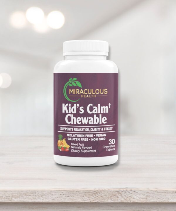 Miraculous Health Kids Calm Chewable bottle on a light wooden surface. The bottle features the Miraculous Health logo with text highlighting 100% Calcium Ascorbate, a non-acidic dietary supplement. Miraculous Health offers the finest vitamins and supplements to fuel your health and wellness journey. Visit MiraculousHealth.org to learn more!