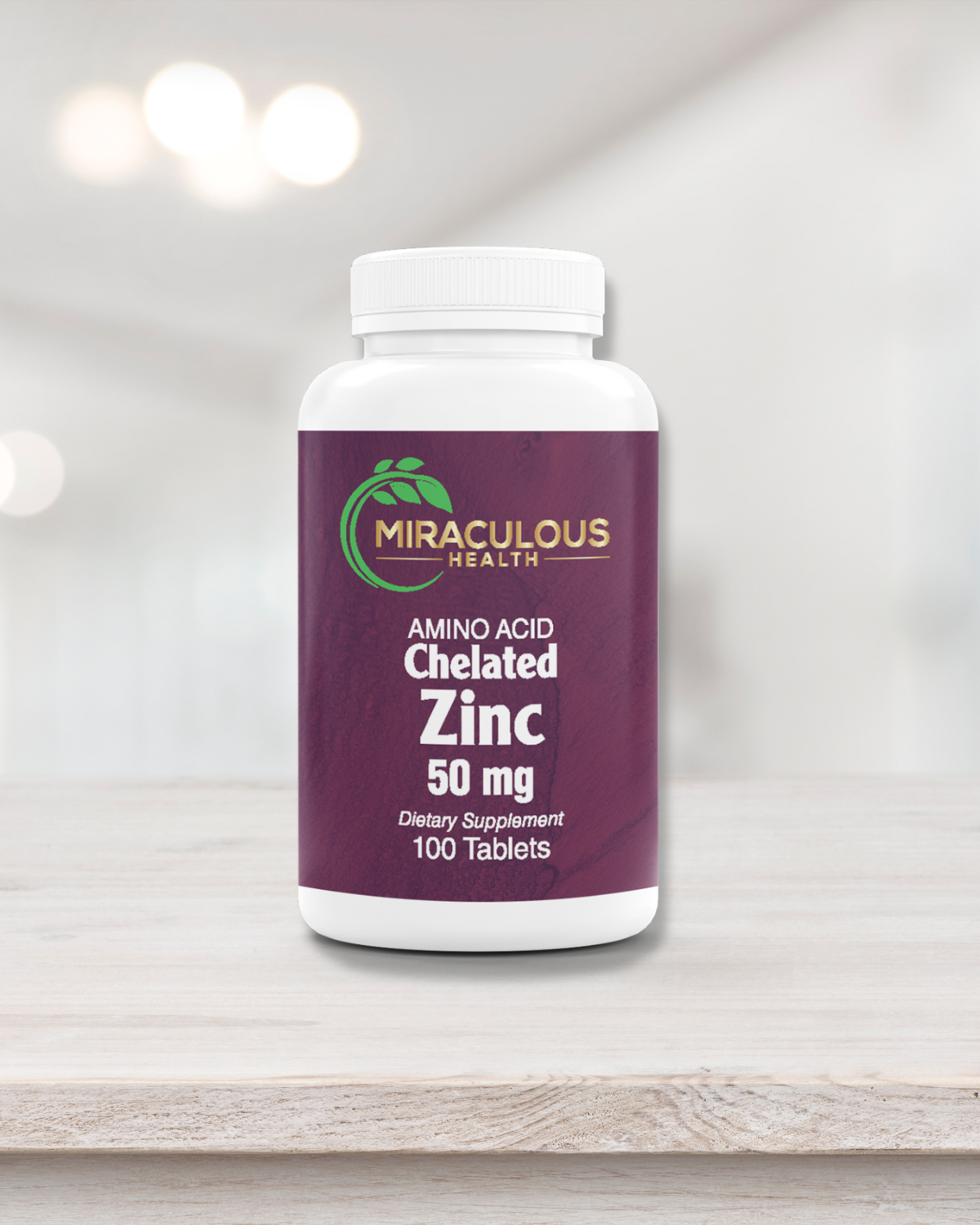 Miraculous Health Chelated Zinc supplement bottle, positioned on a wooden platform with a smooth backdrop. The label reads 'Amino Acid Chelated Zinc 50 mg' and contains 100 tablets, supporting immune and cellular health. This product is part of Miraculous Health's high-quality line of supplements. Miraculous Health offers the finest vitamins and supplements to fuel your health and wellness journey. Visit MiraculousHealth.org to learn more!